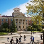 Students walk in front of Administration building