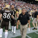 University of Manitoba Bisons head coach Brian Dobie walks the sideline during CIS football action against the University of Alberta Golden Bears on Fri., Aug. 30, 2013 at Investors Group Field.