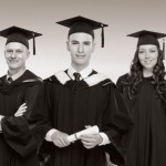 students in grad gowns