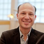 Dentistry professor Robert Schroth brightens smiles in the community.