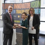 Dr. Chona Lim receives her diploma from Dr. Jeff Sisler and Dr. Martina Reslerova