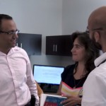 Salah Mahmud Speaking with colleagues