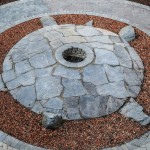 The turtle sculpture where sacred fires are lit is located in front of the NCTR.