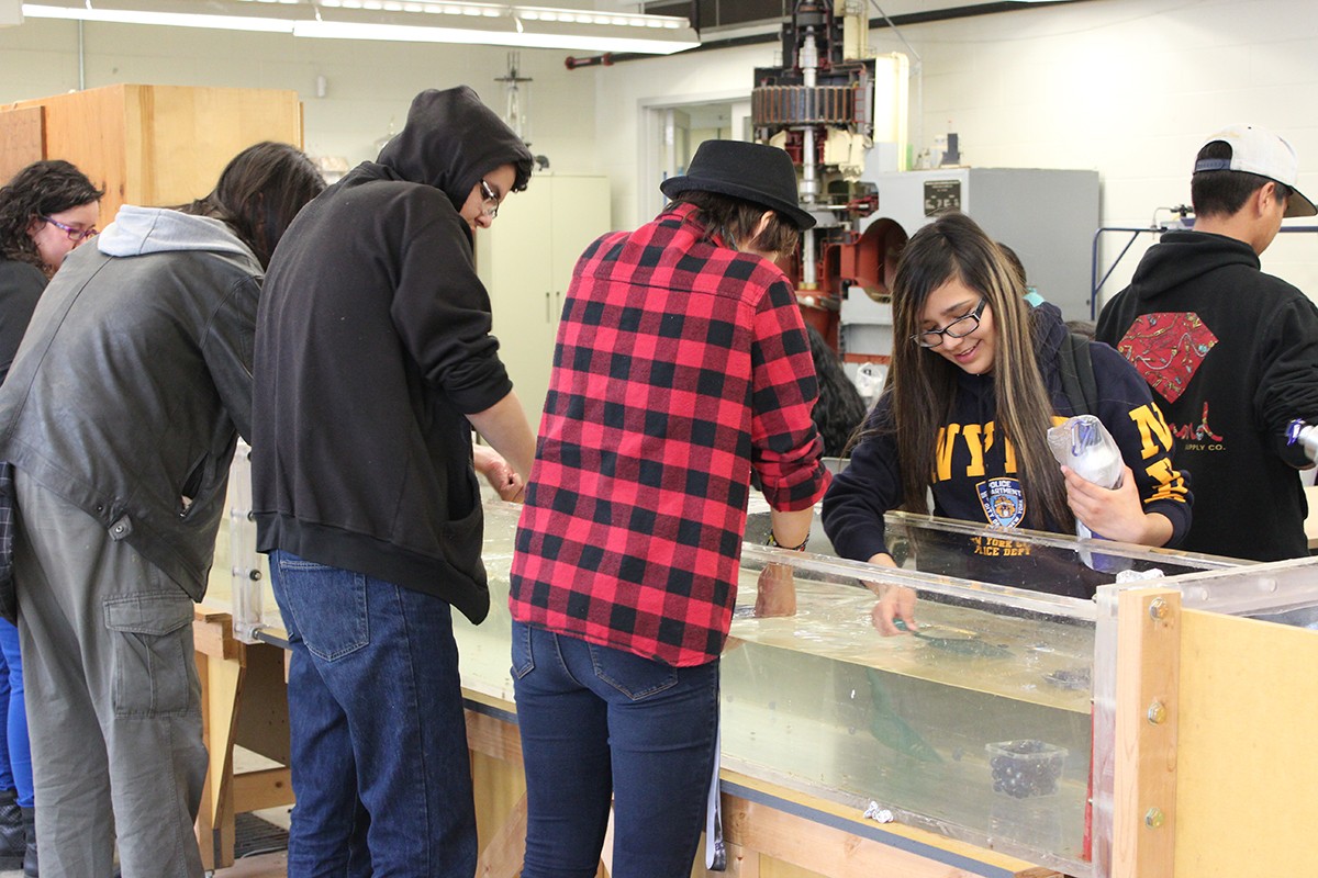 High school students from the Indigenous post-secondary leadership club participating in the engineering lab activity