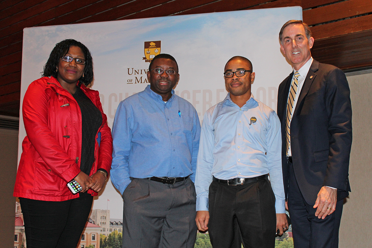 (from left) Victoria Shears, master’s student in social work, Rotimi Aluko, professor of human nutritional sciences, Ifeanyi Nwachukwu, doctoral student in human nutritional sciences, and Jay Doering, vice-provost (graduate education) and dean of Graduate Studies.