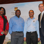 (from left) Victoria Shears, master’s student in social work, Rotimi Aluko, professor of human nutritional sciences, Ifeanyi Nwachukwu, doctoral student in human nutritional sciences, and Jay Doering, vice-provost (graduate education) and dean of Graduate Studies.