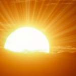 the sun rising brightly