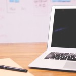 pen, paper and laptop