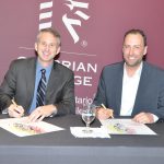 Cambrian College President Bill Best and National Centre for Truth and Reconciliation (NCTR) Director Ry Moran affirm a new partnership between the College and the Centre.