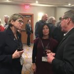 Dr. Annemieke Farenhorst engaged in conversation with University of Manitoba alumni at the Calgary reception.