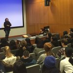 Audience listing to response during question and answer