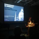 Marc Grellert gives the opening lecture for the Synagogues in Germany exhibit