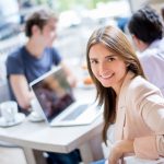 Woman studying at a cafe