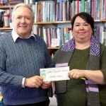 Colin Bonnycastle, Director of the Northern Social Work Program presents Michelle Dorion with scholarship