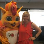 Shawnee Scatliff with Canada Summer Games mascot Niibin.