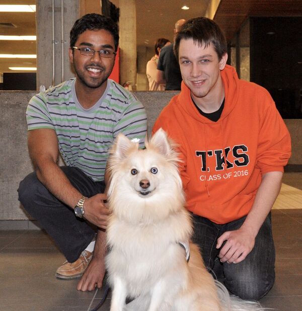 Mentor Kapilan with Mentee Nathan at Pause for Paws