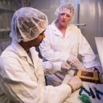 Sakib Rahman, a second year PhD student with Mammei in the clean lab. // Photo by David Lipnowski