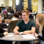 Students in a group studying in the Elizabeth Dafoe Library