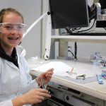 Take Our Kids to Work Day - a student using using orthodontic tools
