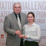 U of M President David Barnard with Rachel Nickel, winner of the 2017 3MT competition.