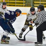 Bison captain, Brett Stovin faces off against Mount Royal’s David Stephens, October 27, 2017 // Photo: Jeff & Tara Miller