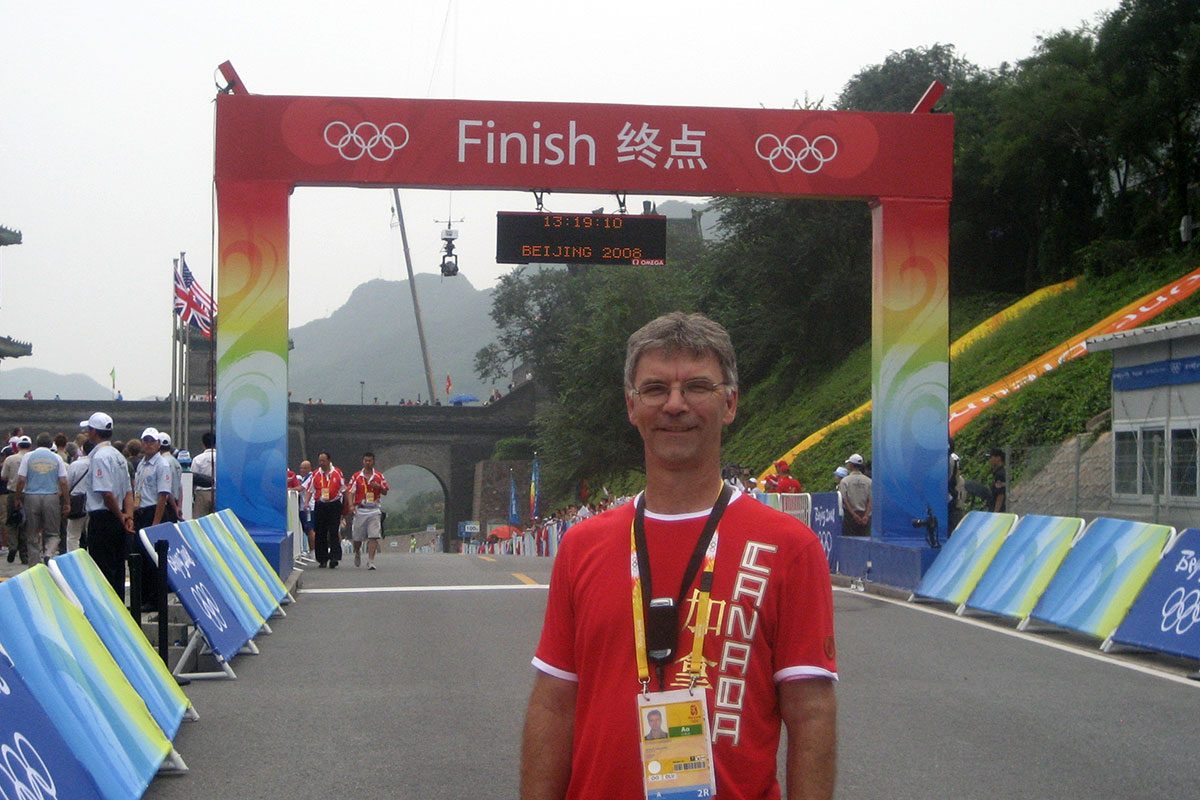 Dr. Glen Bergeron at the finish line for cycling at the 2008 Summer Olympics in Beijing.