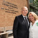 DR. GERALD AND MRS. REESA NIZNICK IN FRONT OF THE NEW SIGN ON MAY 29, 2018.