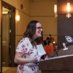 Photo of Carling Nordin standing at a podium