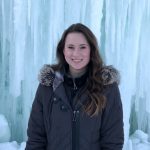 Photo of Taylor Nimchonok with ice-wall in the background