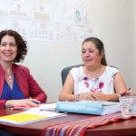 (L-R): Michelle Driedger, with research partners at Manitoba Metis Federation, Georgina Liberty and Sheila Carter (Julianne Sanguins, with back to camera).