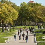 students walking on the pedway on Fort Garry campus in summer time