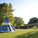 First Year Law Students help erect a tipi in view of Robson Hall as they learn about Indigenous traditions during Orientation Week.