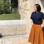 Hee-Jung Serenity Joo, Director, UMIH stands outside the Tier Building