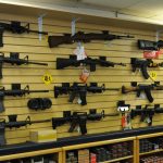 a wall of guns in a store