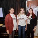 Marla Robson (left) works with student volunteers