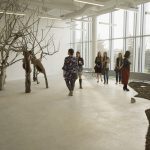 Visitors are intrigued by the installations of artists Shawn Gosek and Robyn Adam at a previous BFA Graduating Exhibition reception