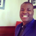 Portrait of Faculty of Arts alumnus Emmanuel Briggs