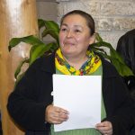 Victoria McIntosh smiles as her art is unveiled.