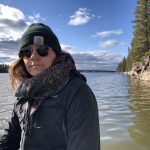 A photo of Braydn Matheson on a boat in a lake at Leaf Rapids, Manitoba.