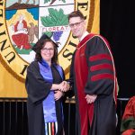 Bonnie Murray, Applied Counselling program grad, is congratuated by Paul Jenkins, Manager, Delivery, Extended Education.