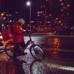 Bicycle delivery person on city street