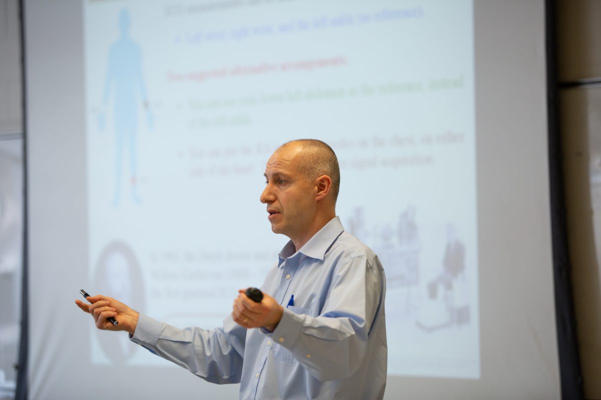 professor-presenting-in-front-of-screen