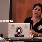 Cheyenne Thomas speaking at podium