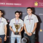 Three Boys on a podium