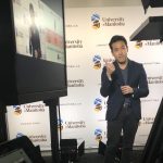 Three Minute Thesis presenter in front of camera