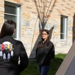 Indigenous Circle of Empowerment students outside of Migizii Agamik.