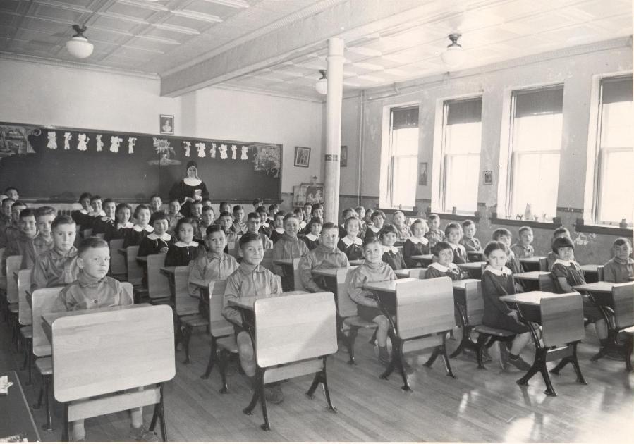 A black and white photo of the Shubenacadie Residential School classroom in Nova Scotia.