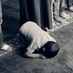 Muslim boy praying
