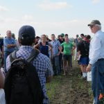Don Flaten speaks to field tour