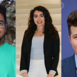 Three students smiling.